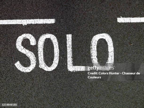 solo painted white on the asphalt of a street - file ellipse sign 47.svg stock pictures, royalty-free photos & images