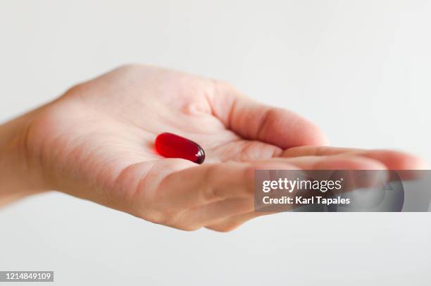 Red Capsule Constipation 47 Red Gel Capsule Stock Photos, High-Res Pictures, and Images - Getty ...