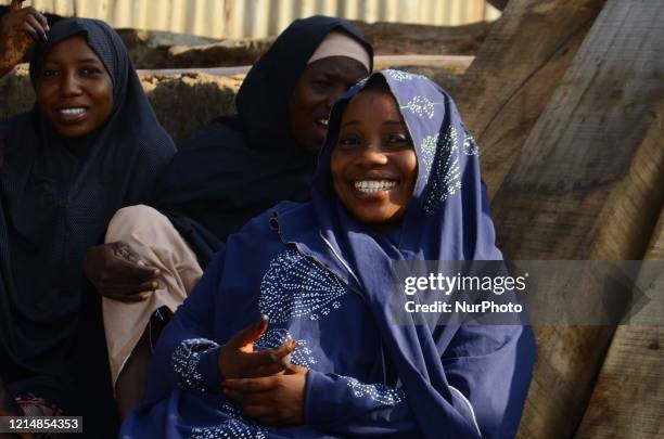 Muslims in Nigeria offer Eid al-Fitr prayers marking the end of the Muslim holy month of Ramadan at a ground in Ogun State on May 24, 2020. Many...