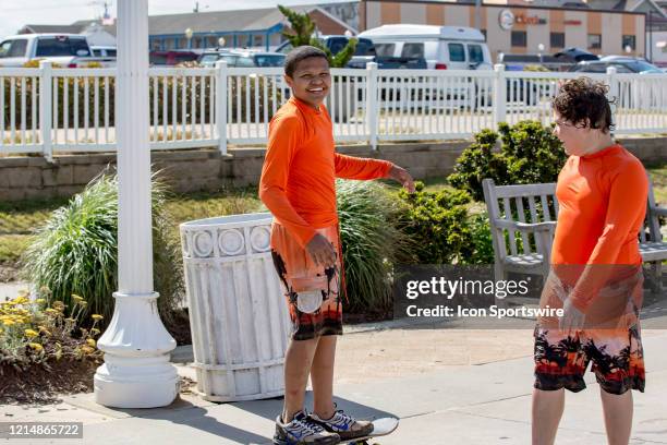 Skateboarder cracks a smile while showing off his talent on May 22 in Virginia Beach, VA. This is the first day of the beach's reopening for...