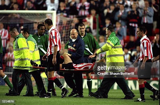 Kevin Phillips of Sunderland is stretchered off the pitch due to injury during the 100th League Championship Challenge match against Liverpool played...