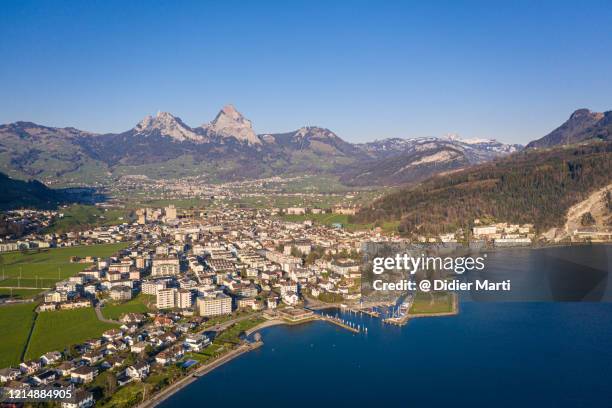 aerial view of the brunnen town in canton schwyz by lake lucerne in switzerland - schwyz stock pictures, royalty-free photos & images