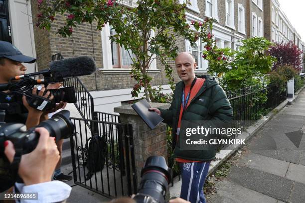 Number 10 Downing Street special advisor Dominic Cummings returns to his home in London on May 24, 2020 following allegations he broke coronavirus...