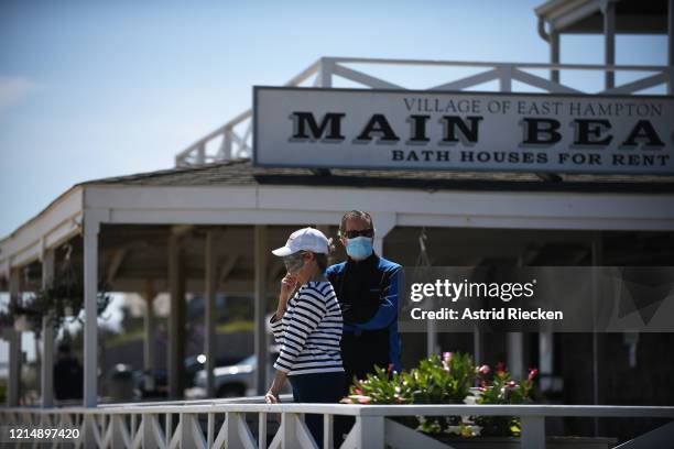 People visit East Hampton Main Beach during Memorial Day weekend on May 24, 2020 in East Hampton, New York. Memorial Day weekend marks the unofficial...