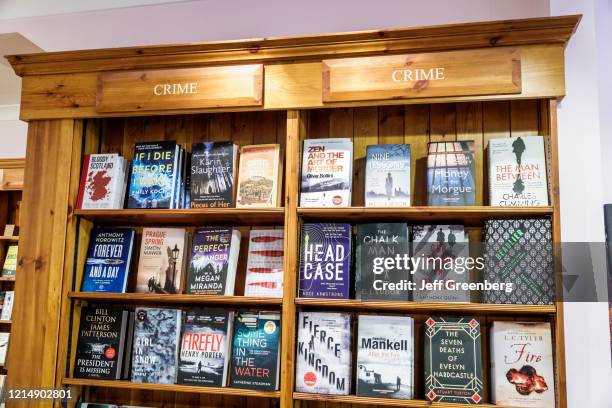 London, Daunt Books, crime fiction genre display shelves.