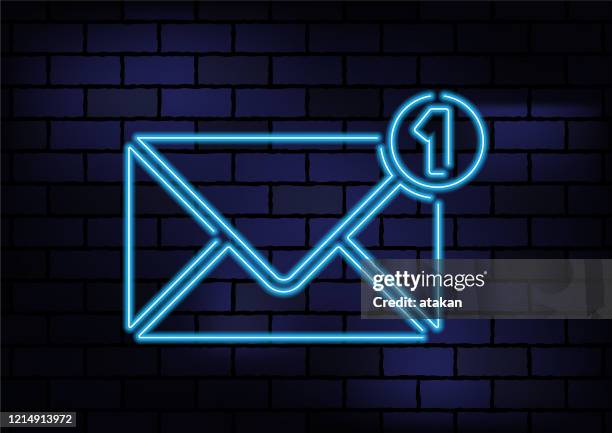 email symbol blue neon light on dark brick wall - energy distribution stock illustrations