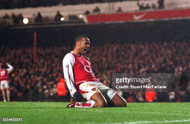 Thierry Henry celebrates scoring a goal during the Premier League match between Arsenal and Manchester City on February 1, 2004 in London, England.