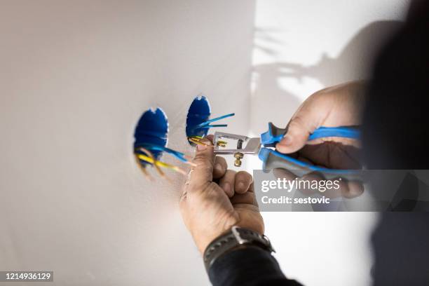 professional electrician job - installing stock pictures, royalty-free photos & images