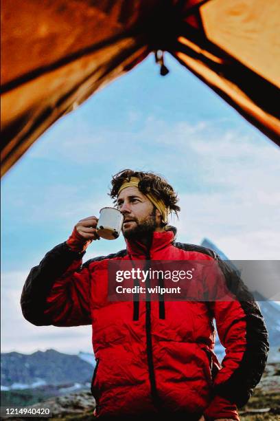 mountaineer personal perspective from tent - man jacket stock pictures, royalty-free photos & images