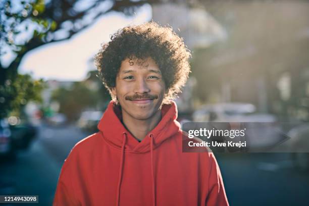 young man outdoors - moustaches stockfoto's en -beelden