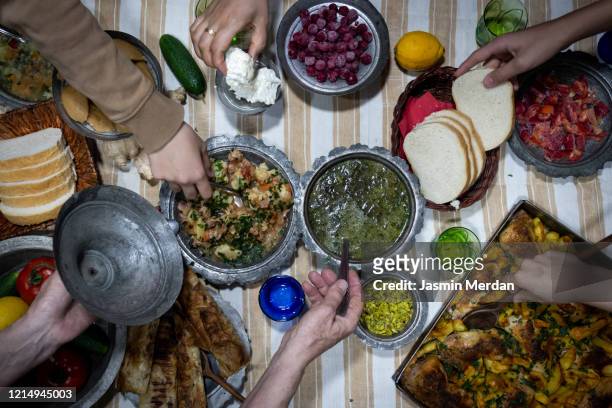top view of ramadan iftar family gathering - arabic food stock-fotos und bilder