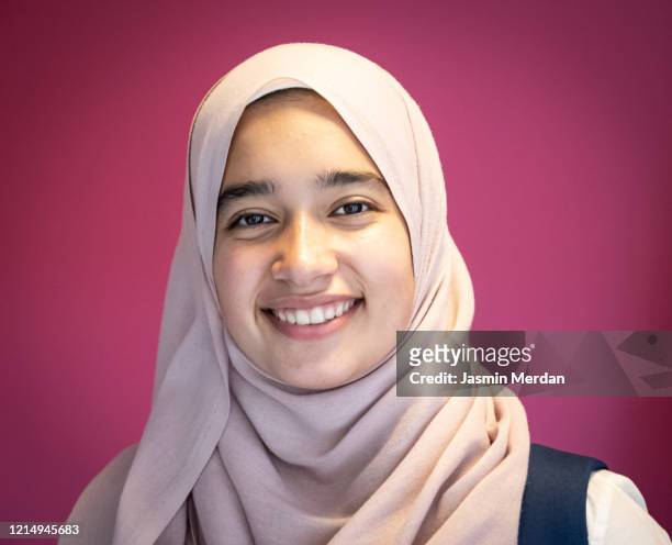 casual muslim arabic student looking happy and smiling - beautiful arabian girls stock pictures, royalty-free photos & images