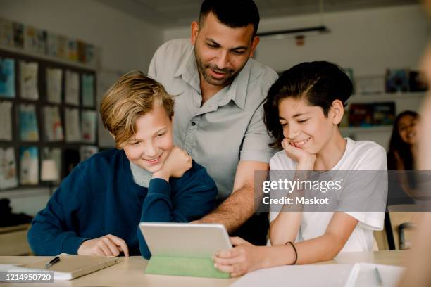 A Tutor Using Technology 3,022 Middle School Students Technology Stock Photos, High-Res Pictures ...