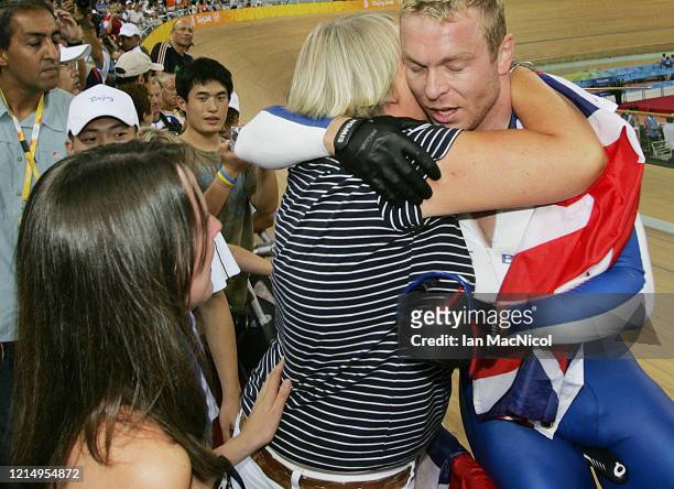 Chris Hoy of Great Britain is seen with his mother Carol after winning gold in the individual sprint during The Beijing Olympic Games on August 19,...