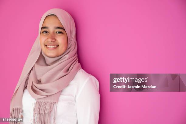 portrait of a mixed race muslim girl - cute arab girls stock pictures, royalty-free photos & images