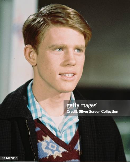 Ron Howard, US actor, wearing a black jacket, patterened V-neck jumper and a blue check shirt in a publicity still issued for the US television...