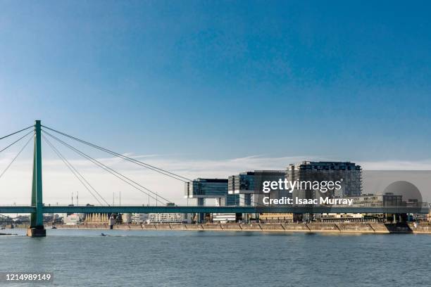 the ultramodern kranhaus buildings lining the rhine river - cologne skyline stock pictures, royalty-free photos & images