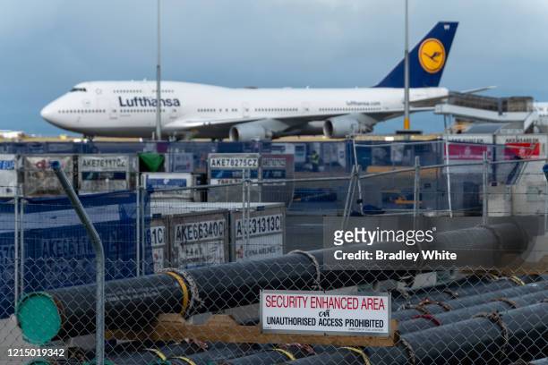 Lufthansa Boeing 747-400 sits on the tarmac at Auckland International Airport after arriving at 7am to pick up German and European travellers on...