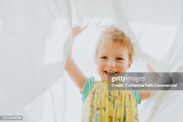 playing under a white sheet - make a change stock pictures, royalty-free photos & images