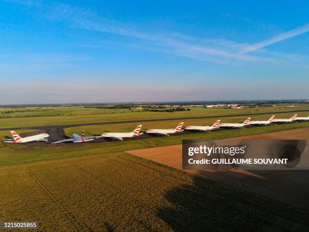 British Airways Airbus A380 aircrafts are parked at the Chateauroux-Deols "Marcel Dassault" Airport on May 22, 2020 in Deols, central France. - Many...