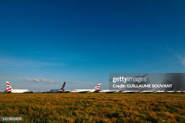 British Airways Airbus A380 aircrafts are parked at the Chateauroux-Deols "Marcel Dassault" Airport on May 22, 2020 in Deols, central France. - Many...