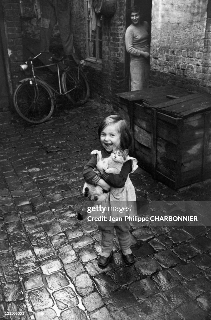 Little Girl With Her Cat, Roubaix, 1958
