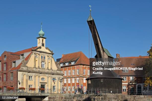 hotel altes kaufhaus and alter kran, old port, old town, lueneburg, lower saxony, germany - lüneburg stock pictures, royalty-free photos & images