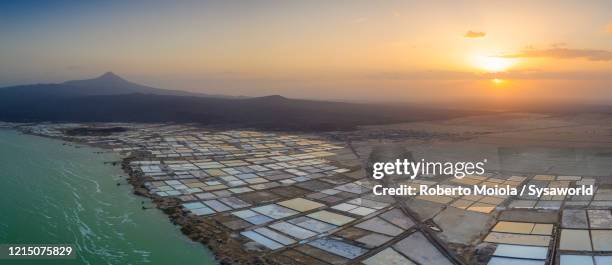 sunset on salt flats and lake afrera, aerial view, danakil depression, afar, ethiopia - salt flats stock-fotos und bilder