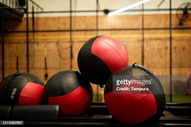 detail of cross-training balls with copy space. - sports ball rack stock pictures, royalty-free photos & images