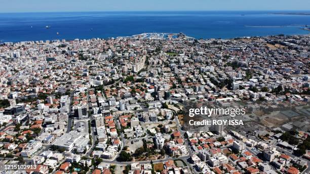 This picture taken on May 24, 2020 shows an aerial view of Cyprus' southern port city of Limassol, during a period of deconfinement following a...