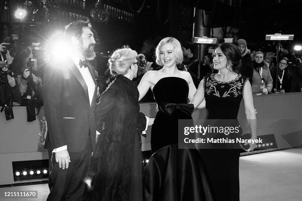 Javier Bardem, director Sally Potter, Elle Fanning and Salma Hayek pose at the "The Roads Not Taken" premiere during the 70th Berlinale International...