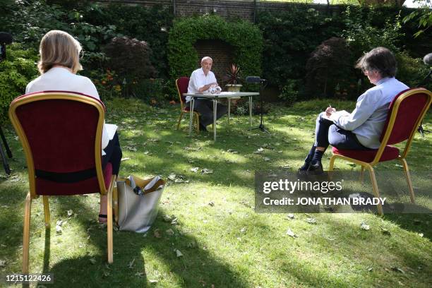 Number 10 special advisor Dominic Cummings speaks as he delivers a statement with journalists sat at a distance in the Rose Garden at 10 Downing...