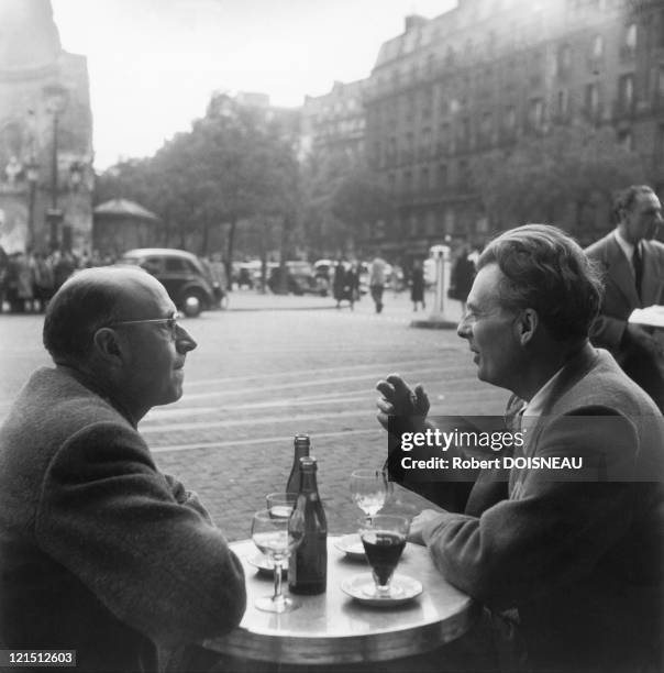 France, Paris, Pierre Neveu And Aldous Huxley, On The Terrace Of Flore Cafe, Saint-Germain-Des-Pres In 1945