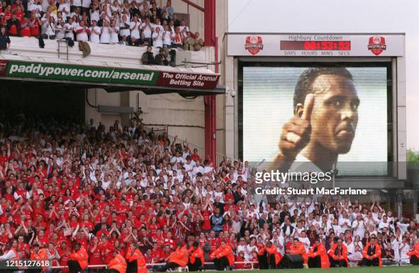 Former Arsenal player David Rocastle image is shown on the big screen after the Premier League match between Arsenal and Wigan Athletic, the last...