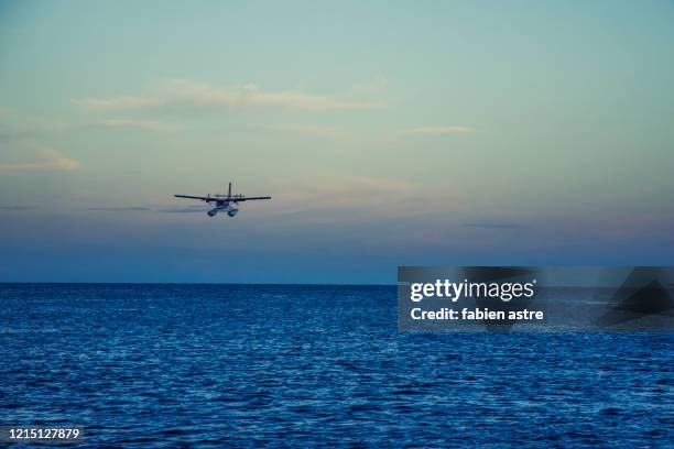 sea plane taxi in the maldives - air taxi stock pictures, royalty-free photos & images