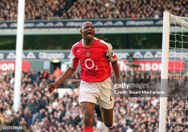 Patrick Vieira celebrates scoring a goal for Arsenal during the Premier League match between Tottenham Hotspur and Arsenal on November 13, 2004 in...