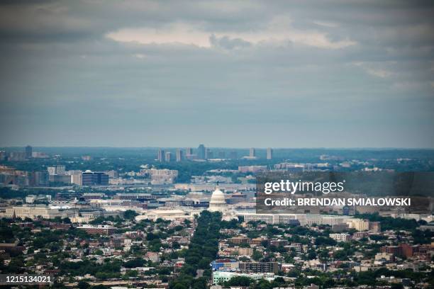 This aerial view of Capitol Hill is seen on May 25 in Washington, DC. - US House Democrats will make history Friday by voting for Washington DC to...