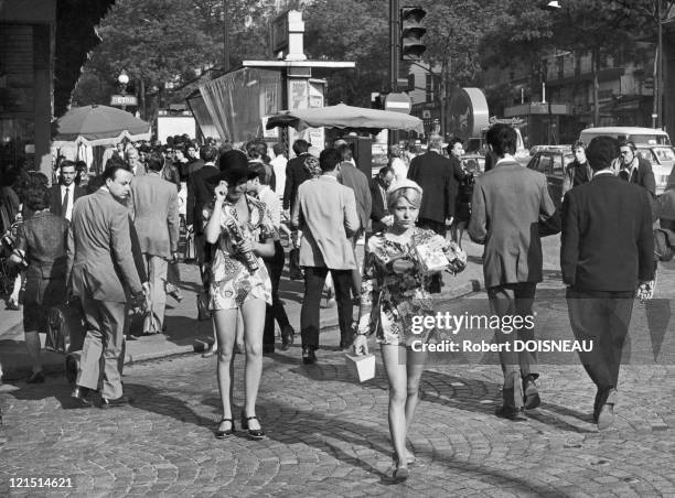 Paris, Young Women Wearing Mini-Skirts On The Grands Boulevards