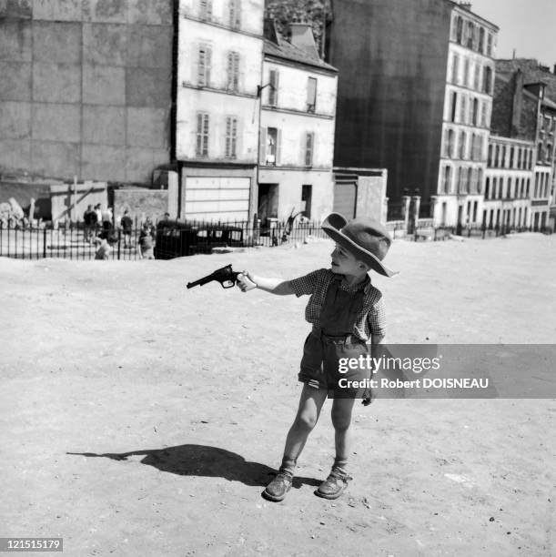 Paris: Menilmontant, Boy Playing Cowboy In A Wasteland