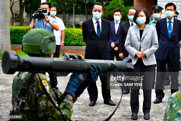 Soldier demonstrates a Taiwanese-made kestrel anti-tank rocket as Taiwan President Tsai Ing-wen inspects the military police headquarters in Taipei...