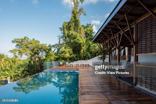 Sun deck with pool. Jalakara Villa Hotel, Andaman and Nicoar Islands, India. Architect: Ajith Andagere, 2016..