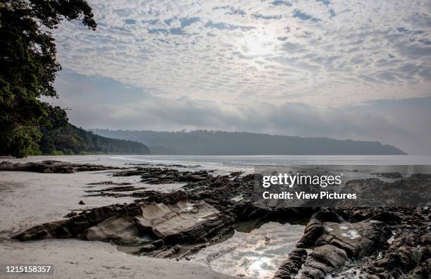 Beach and rock scenery. Jalakara Villa Hotel, Andaman and Nicoar Islands, India. Architect: Ajith Andagere, 2016..