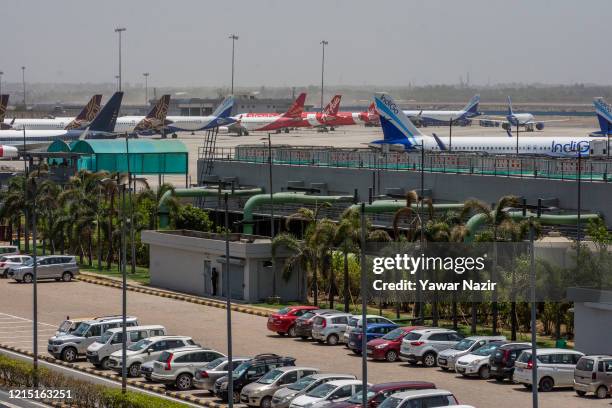 Aircraft stand at Terminal 3 at the Indira Gandhi International Airport, as the country relaxed its lockdown restriction on May 26, 2020 in Delhi,...