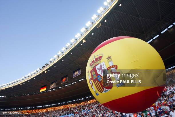 Balloon of the Spanish flag is pictured with the crowd prior to the start of the Euro 2008 championships final football match Germany vs. Spain on...