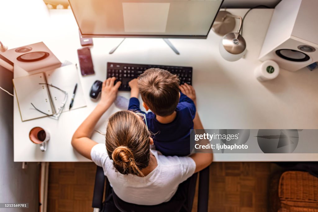 Young mother working from home
