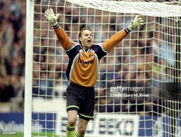 Nicky Weaver of Manchester City celebrates after saving a penalty during the Nationwide Division Two Play-Off Final match against Gillingham played...