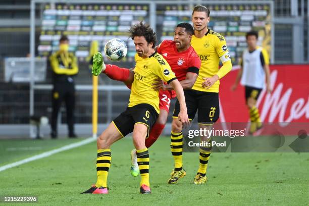 Serge Gnabry of Bayern Munich battles for possession with Thomas Delaney of Borussia Dortmund during the Bundesliga match between Borussia Dortmund...