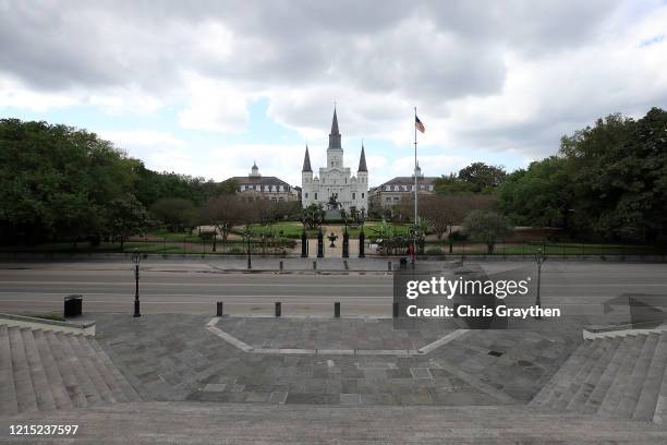 The St. Louis Cathedral and Jackson Square are empty in the French Quarter amid the coronavirus pandemic on March 27, 2020 in New Orleans, Louisiana....
