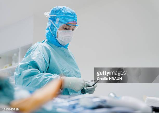 healthcare worker during covid 19 virus outbreak - hospital quarantine stock pictures, royalty-free photos & images