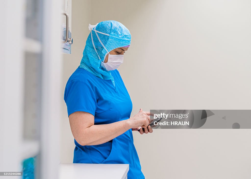 Healthcare worker at work wearing protective clothing